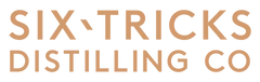 Six-Tricks Distilling Co. logo